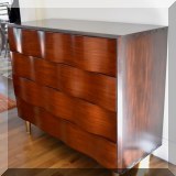 F03. Keno Brothers 4-drawer chest with offset waves. 40”h x 48”w x 19”d 